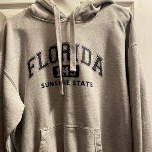 Jacket, the size is L, the brand is Ganix INC, the color is gray.